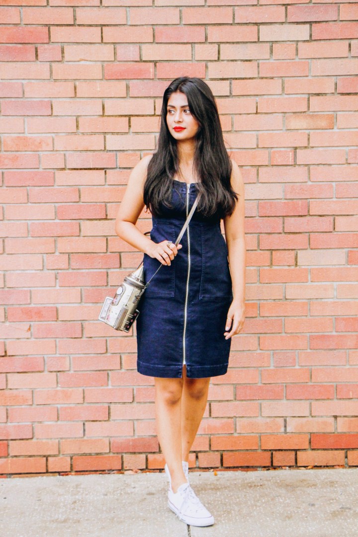 bricks walls denim dress red lips white shoes 